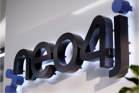 A Neo4j logo sign on a wall.