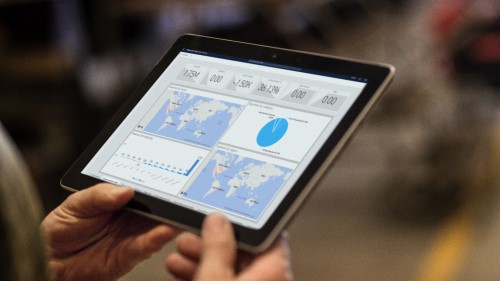 Person viewing website analytics on tablet