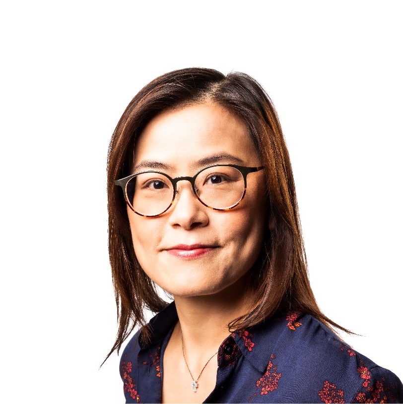 Image of Ann Choi wearing glasses and smiling