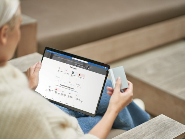 Woman reading a tablet screen.