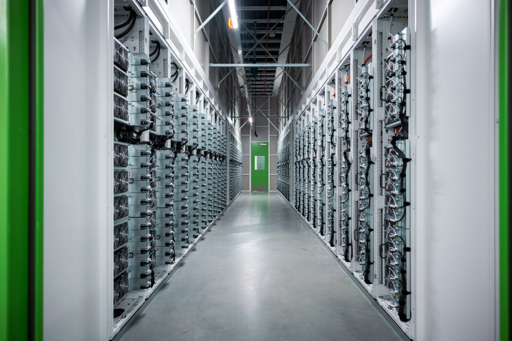 A long hallway of server racks