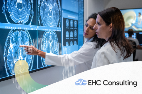 Two people looking at a medical scan of a brain.