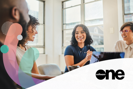 People around a table smiling and talking