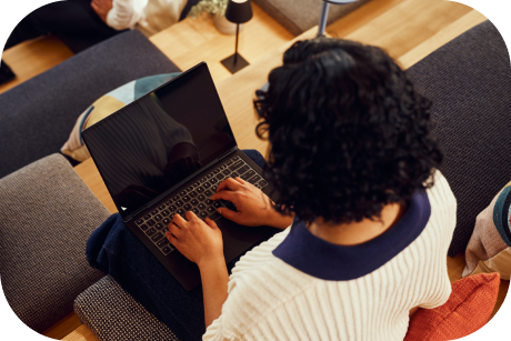 A person working on a laptop.