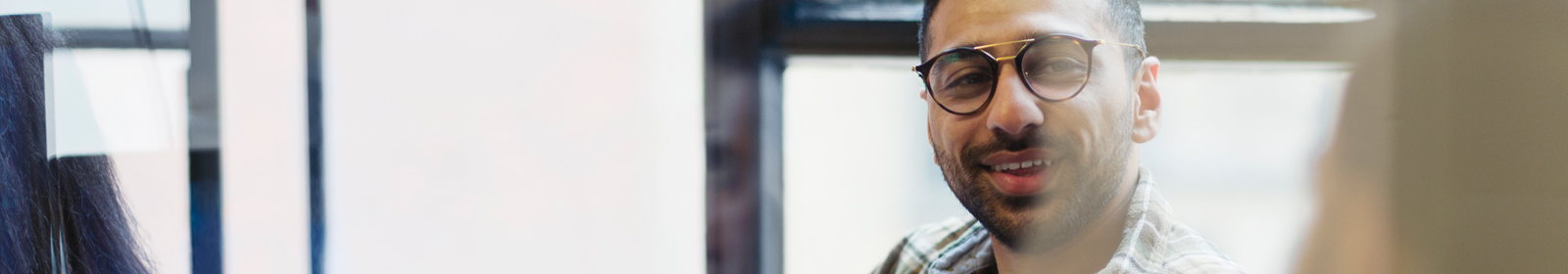 A man works in a fancy conference room