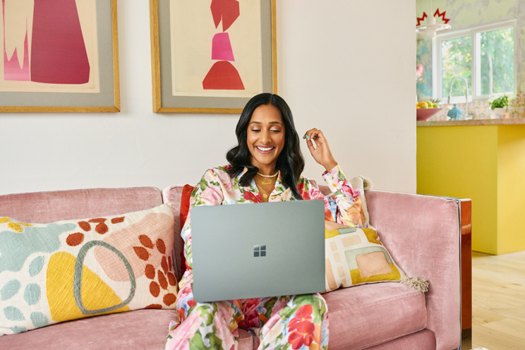 Woman working from home in a cheerfully decorated room