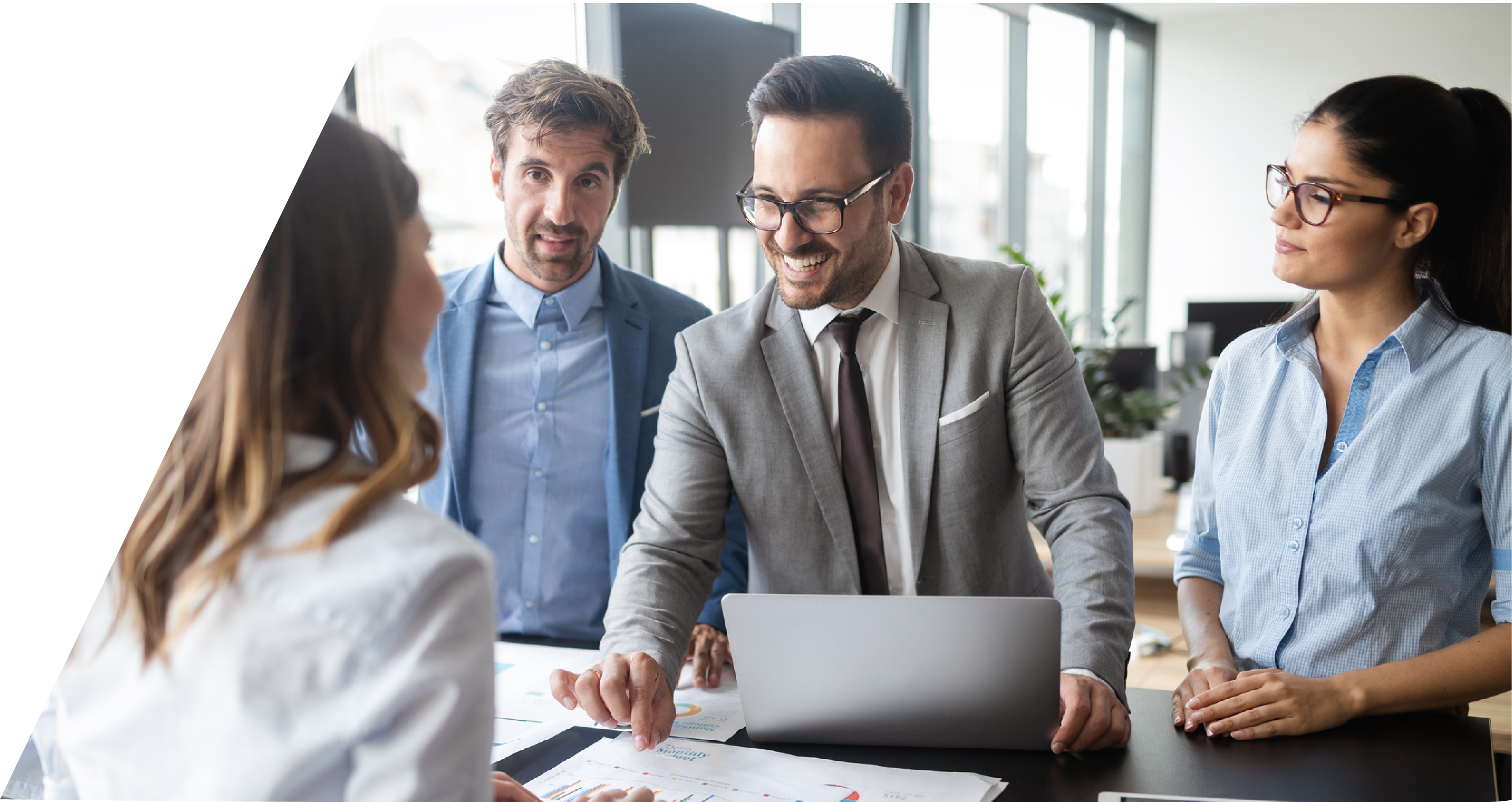 Group of people having conversation in office