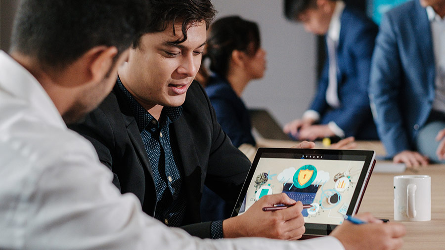 man working on tablet