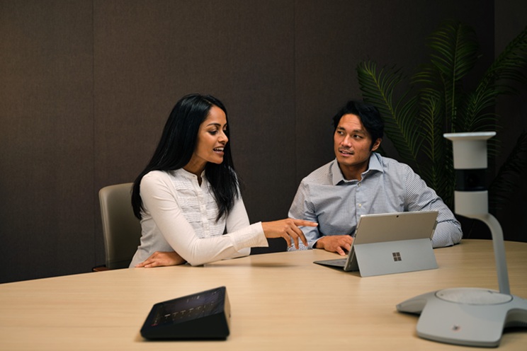 Coworkers collaborate on a project