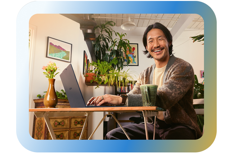 Person working on a laptop at home.