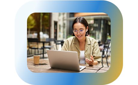 Person looking at a laptop.