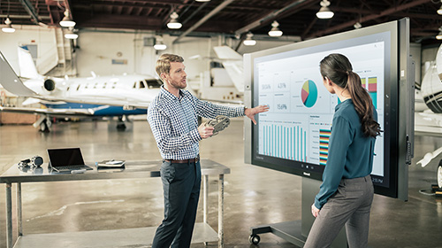 Silver benefits: Two people in a meeting 