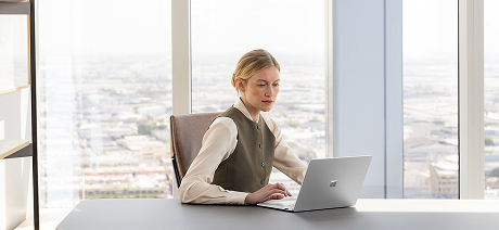 A person working with Surface device